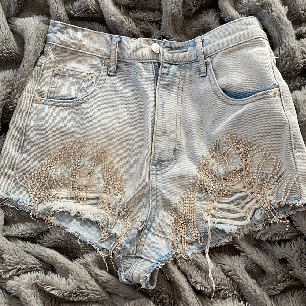 White fox angel energy denim shorts